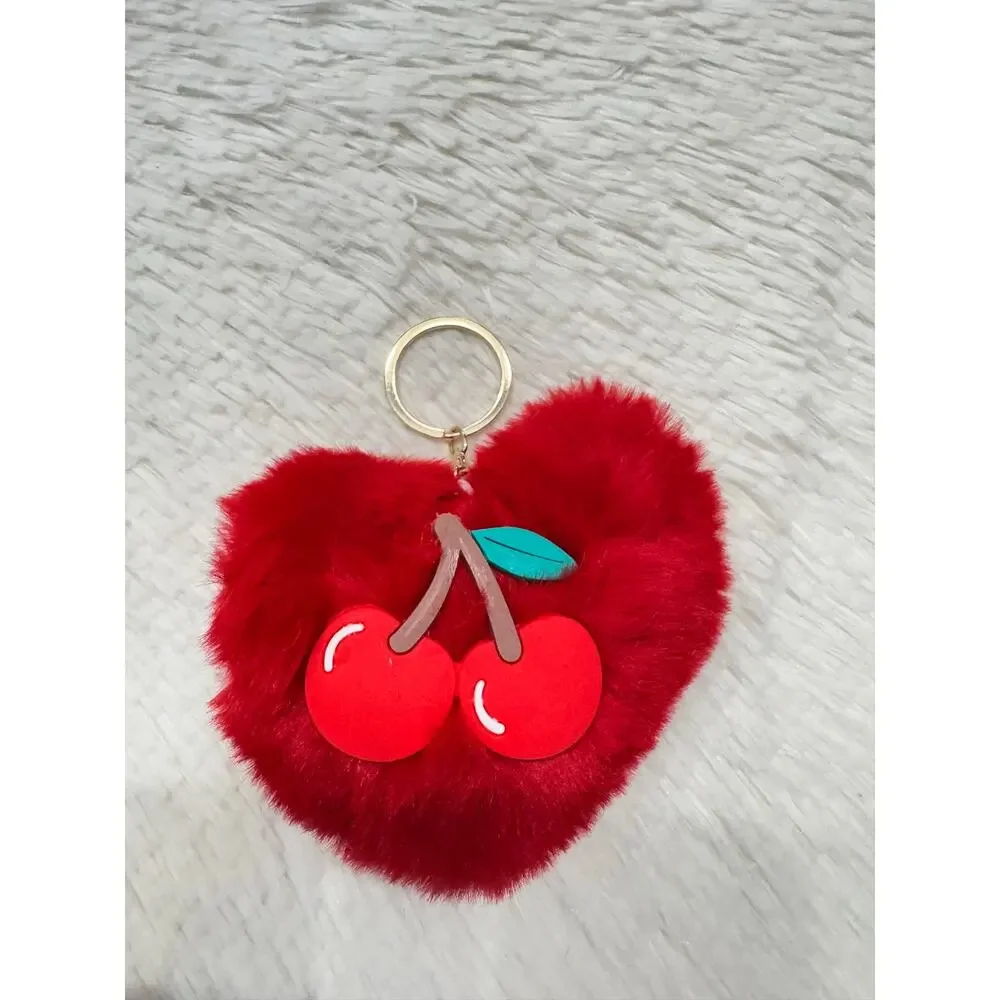 Fuzzy red heart Pompom keychain with cherry and gold metal bag charm